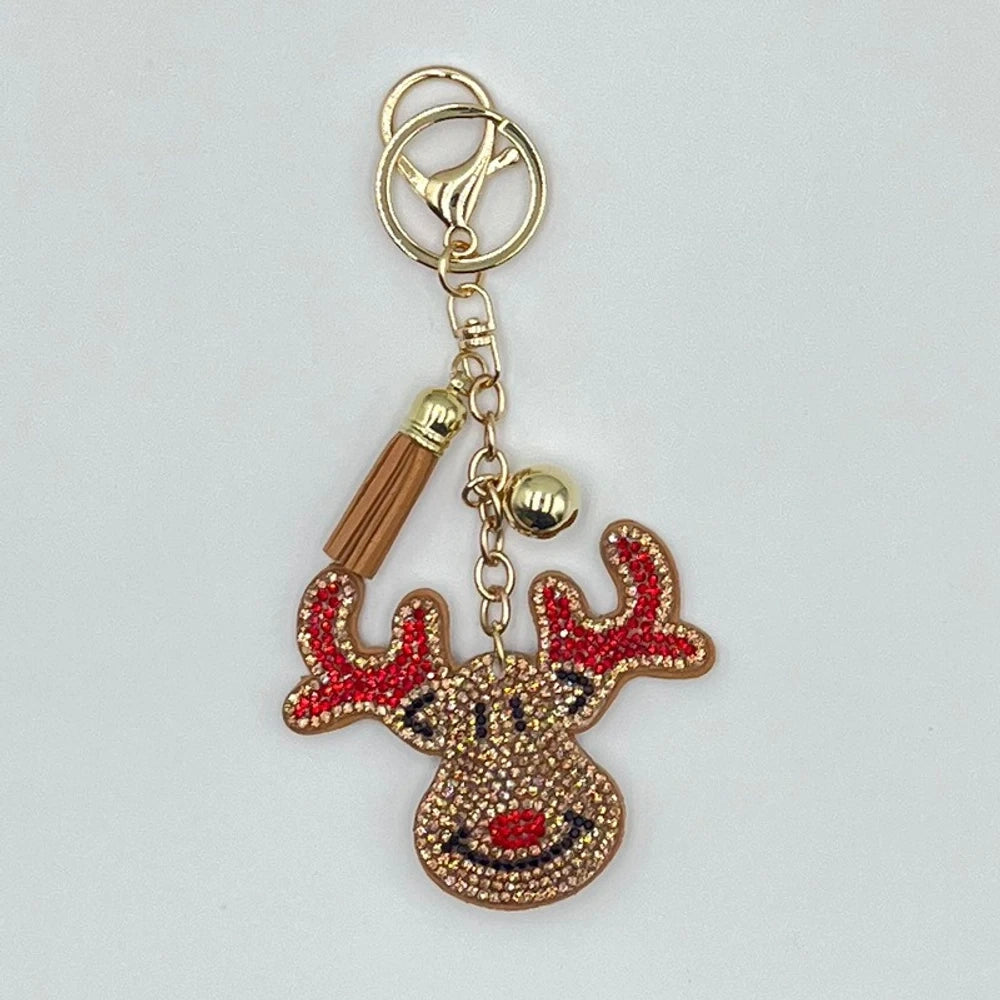 Set of 6 Christmas diamond painting keychains featuring Santa Claus, reindeer, Christmas tree, star, jingle bells, and mitten designs with tassels and jingle bell charms on silver and gold rings. - Wapiti