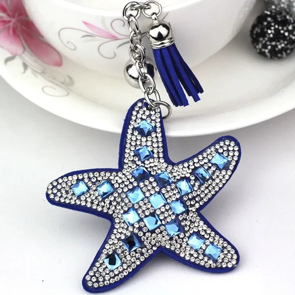Assorted large rhinestone starfish faux leather fancy beads in black, red, silver, purple, pink, aqua, blue, and white. - Blue