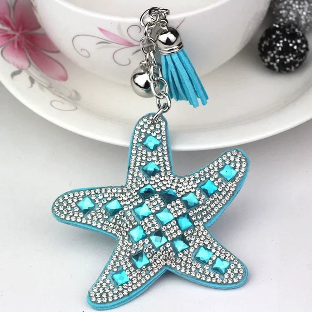 Assorted large rhinestone starfish faux leather fancy beads in black, red, silver, purple, pink, aqua, blue, and white. - Lake Blue