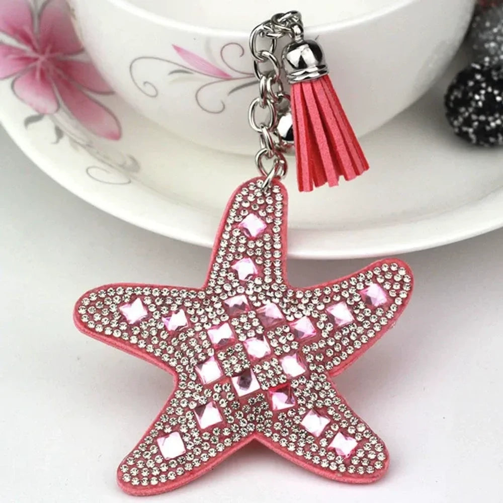 Assorted large rhinestone starfish faux leather fancy beads in black, red, silver, purple, pink, aqua, blue, and white. - Pink