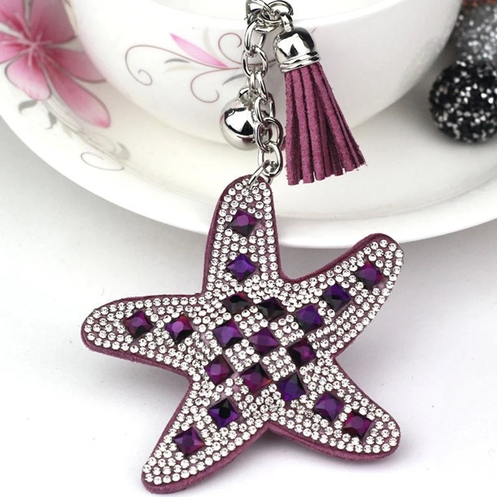 Assorted large rhinestone starfish faux leather fancy beads in black, red, silver, purple, pink, aqua, blue, and white. - Purple