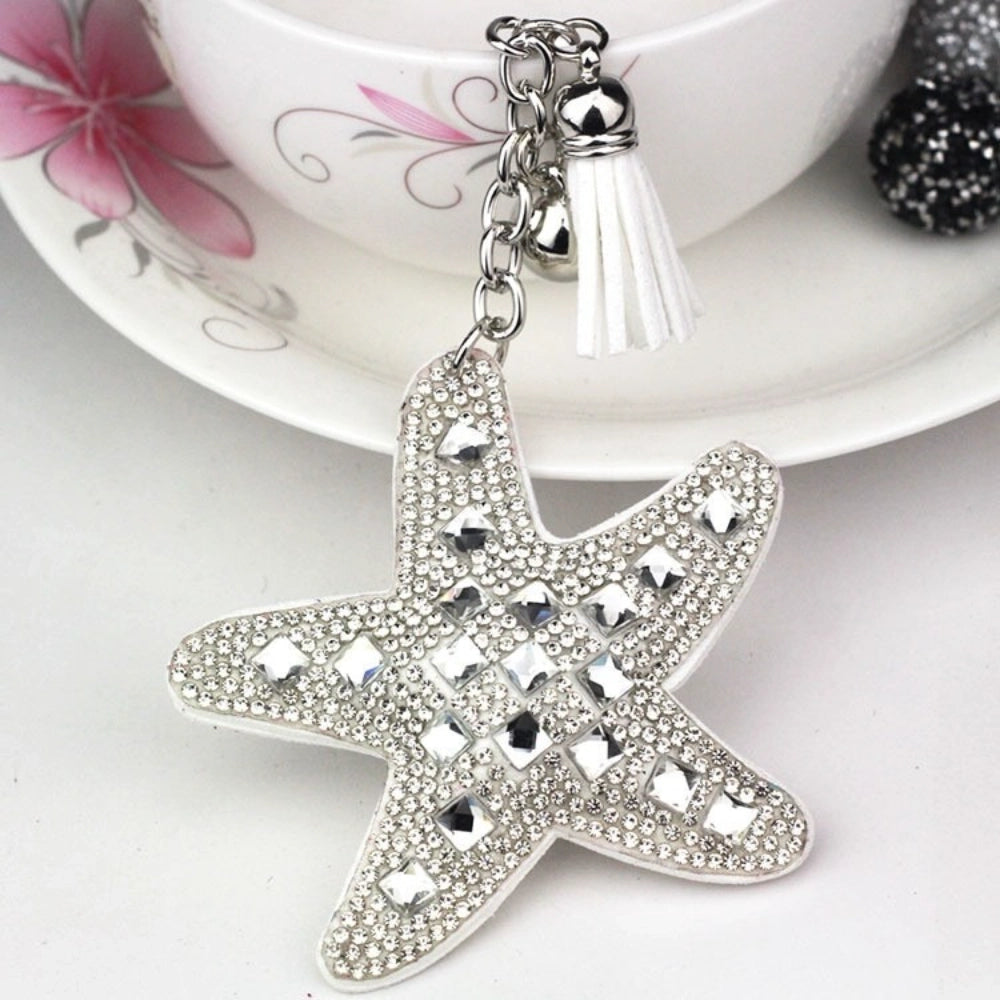 Assorted large rhinestone starfish faux leather fancy beads in black, red, silver, purple, pink, aqua, blue, and white. - White