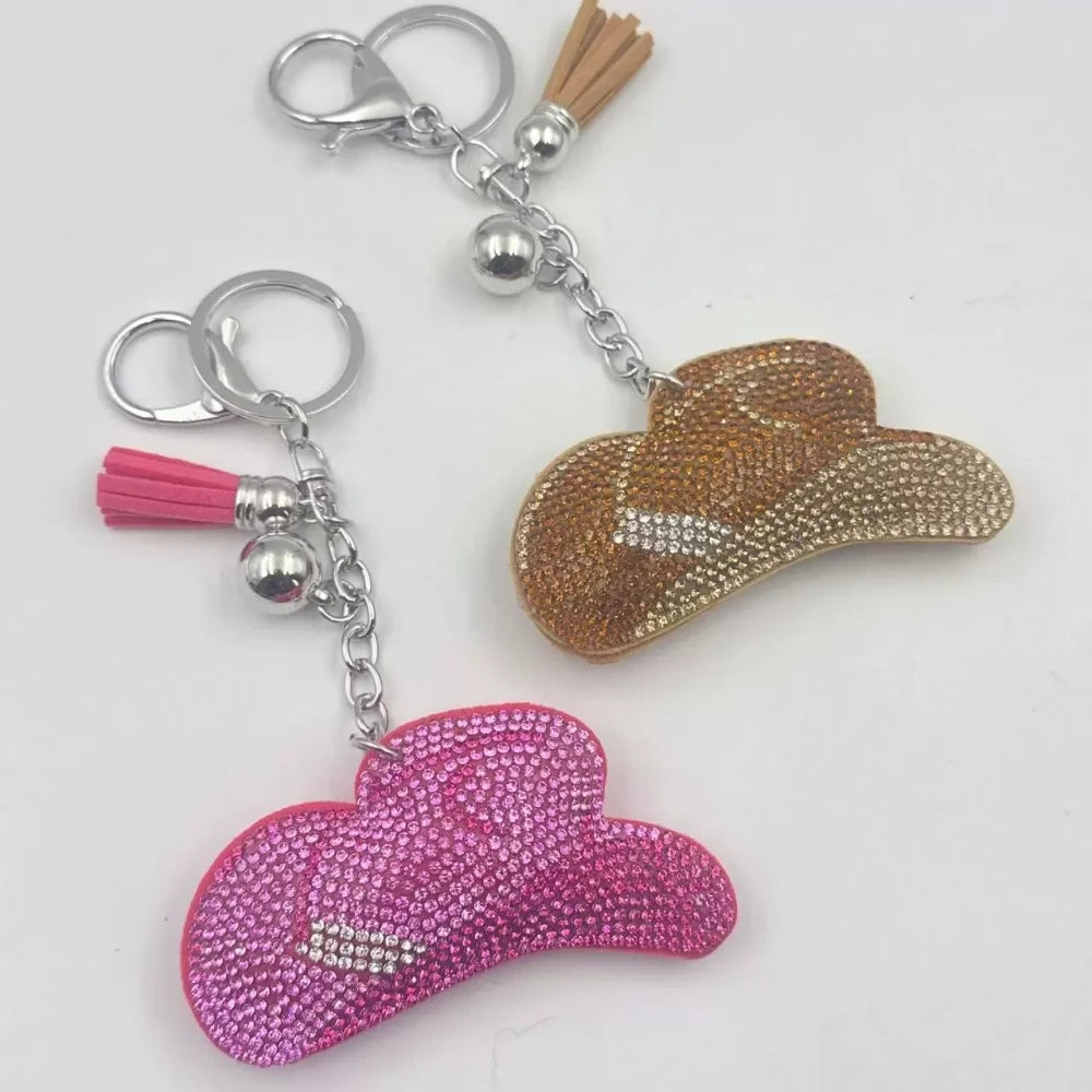 Pink and gold rhinestone cowboy hat fancy bead charms with tassels and key rings on a white background - Random Mixed