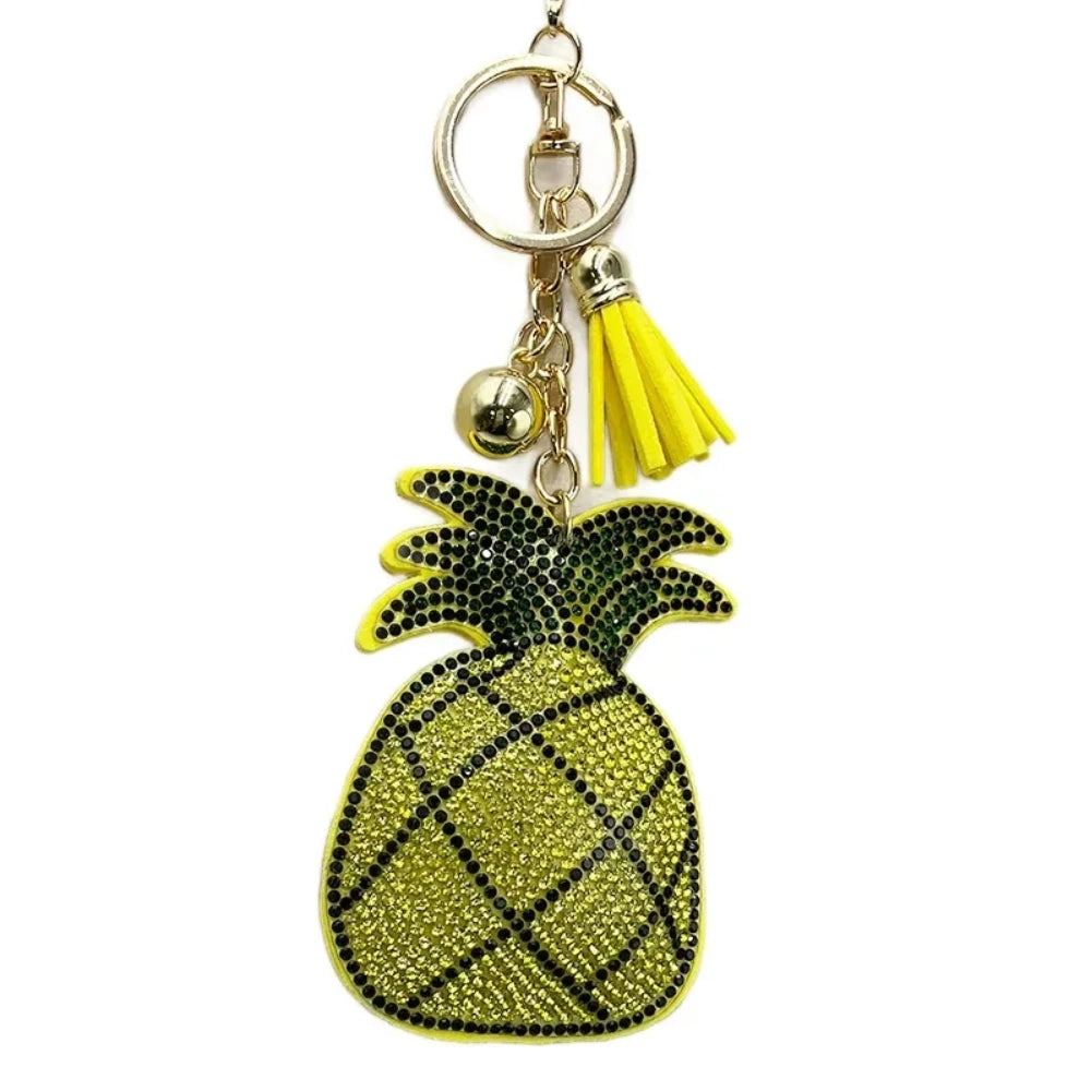 Yellow and black rhinestone pineapple keychain charm with gold ring, small bell, and yellow tassel, perfect for DIY jewelry making and keychains.