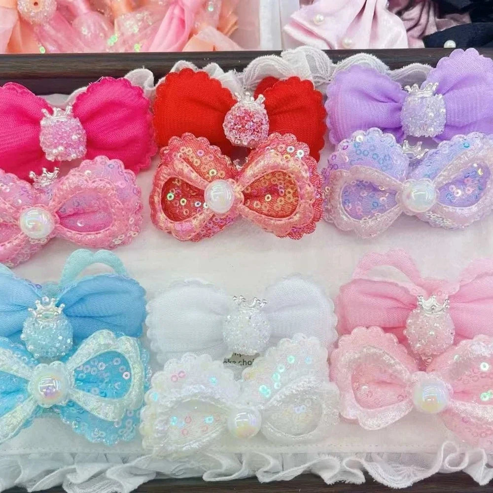 Assorted colorful sequin lace bow fancy beads with pearl center and crown embellishment in pink, red, purple, blue, white, and light pink for DIY jewelry making and beadable pens.