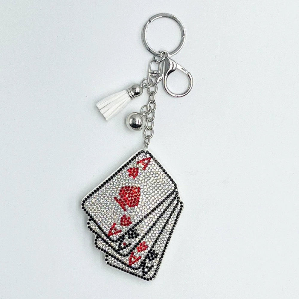 Silver-tone rhinestone playing card fancy bead charm with red and black card suits, tassel, and keyring