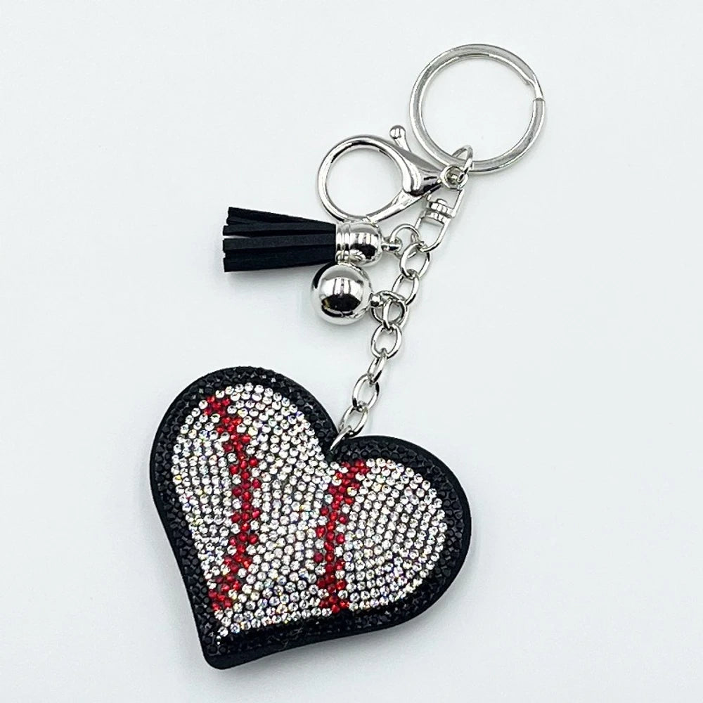Assorted heart-shaped sports rhinestone fancy beads in baseball, football, basketball, volleyball, and tennis designs with tassel keychain hardware. - Black