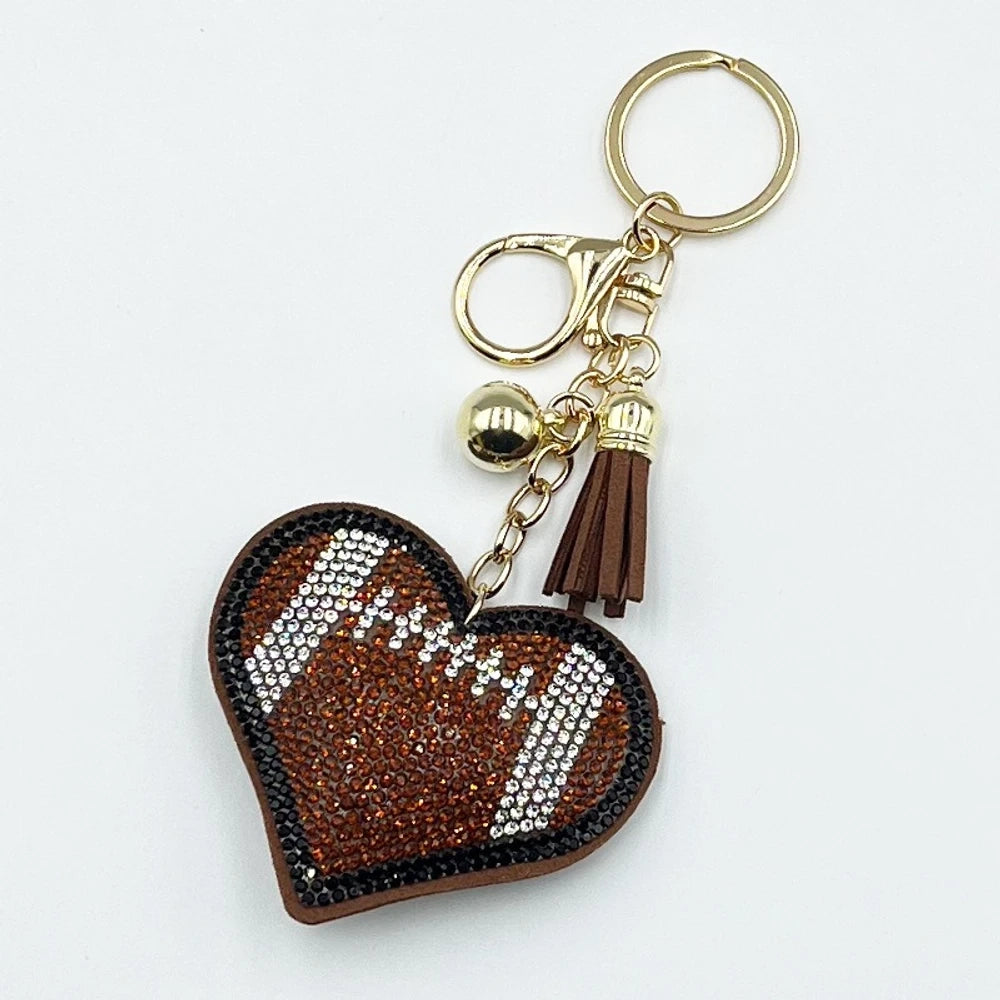 Assorted heart-shaped sports rhinestone fancy beads in baseball, football, basketball, volleyball, and tennis designs with tassel keychain hardware. - Coffee 1