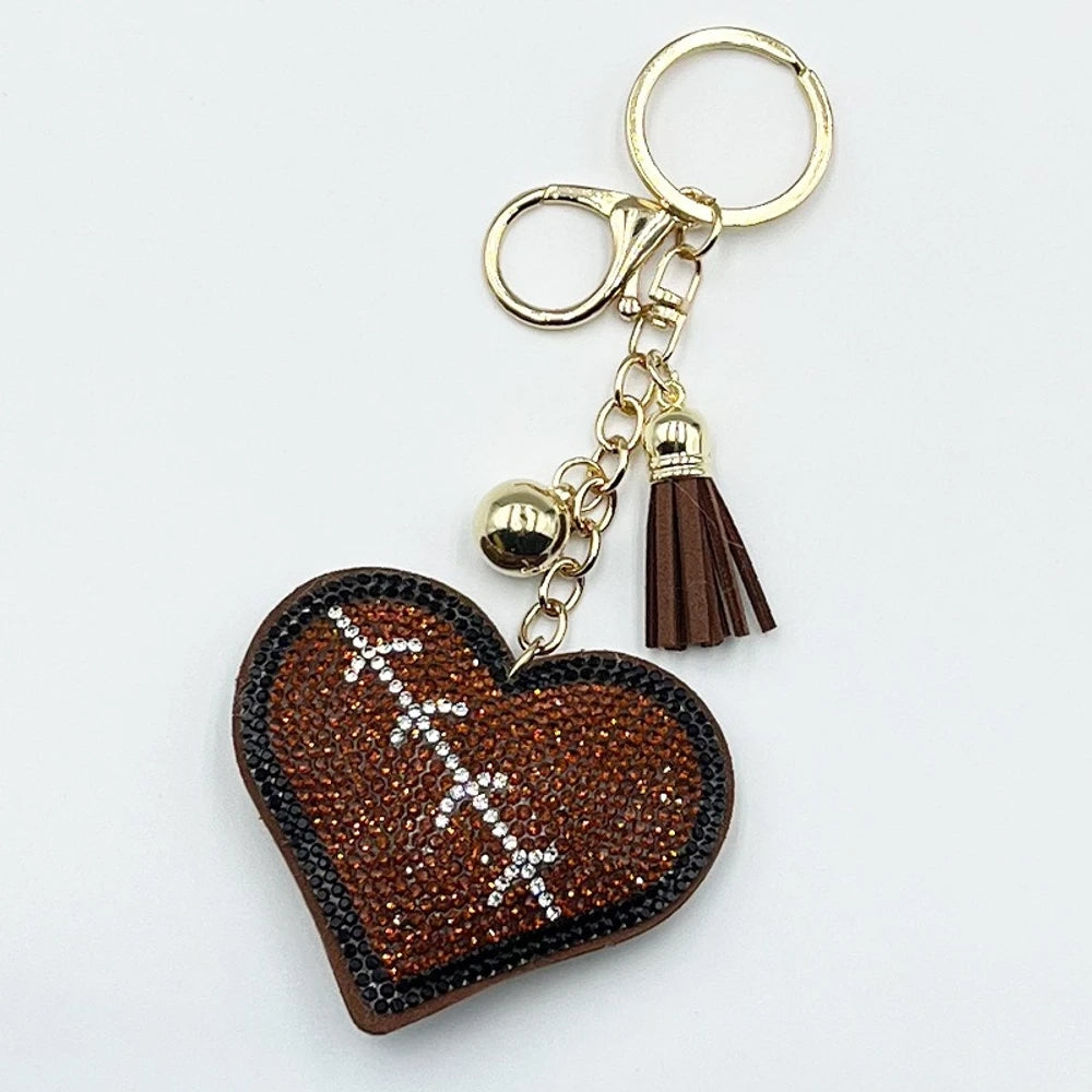 Assorted heart-shaped sports rhinestone fancy beads in baseball, football, basketball, volleyball, and tennis designs with tassel keychain hardware. - Coffee 2