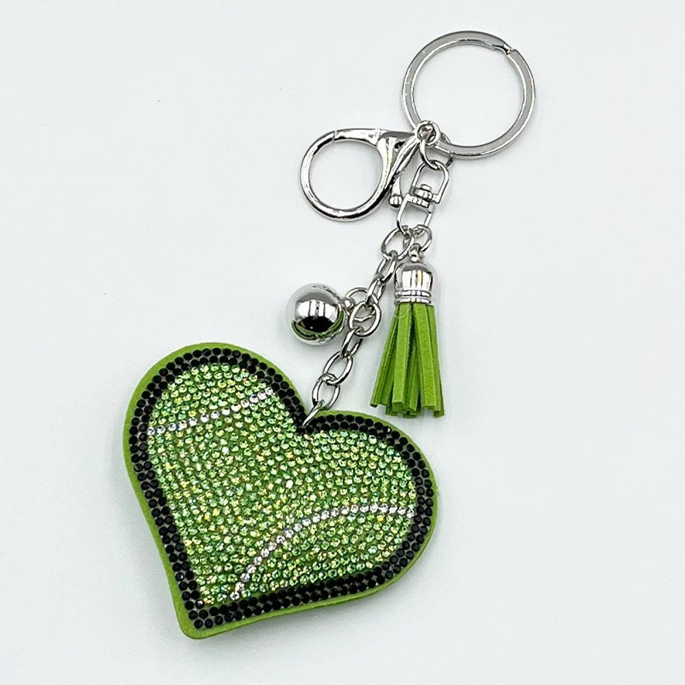 Assorted heart-shaped sports rhinestone fancy beads in baseball, football, basketball, volleyball, and tennis designs with tassel keychain hardware. - Green