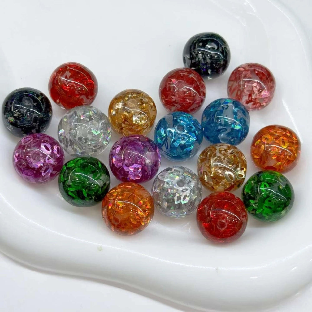 Assorted 16MM round mixed-color crackle acrylic beads with a glossy translucent finish on a white tray