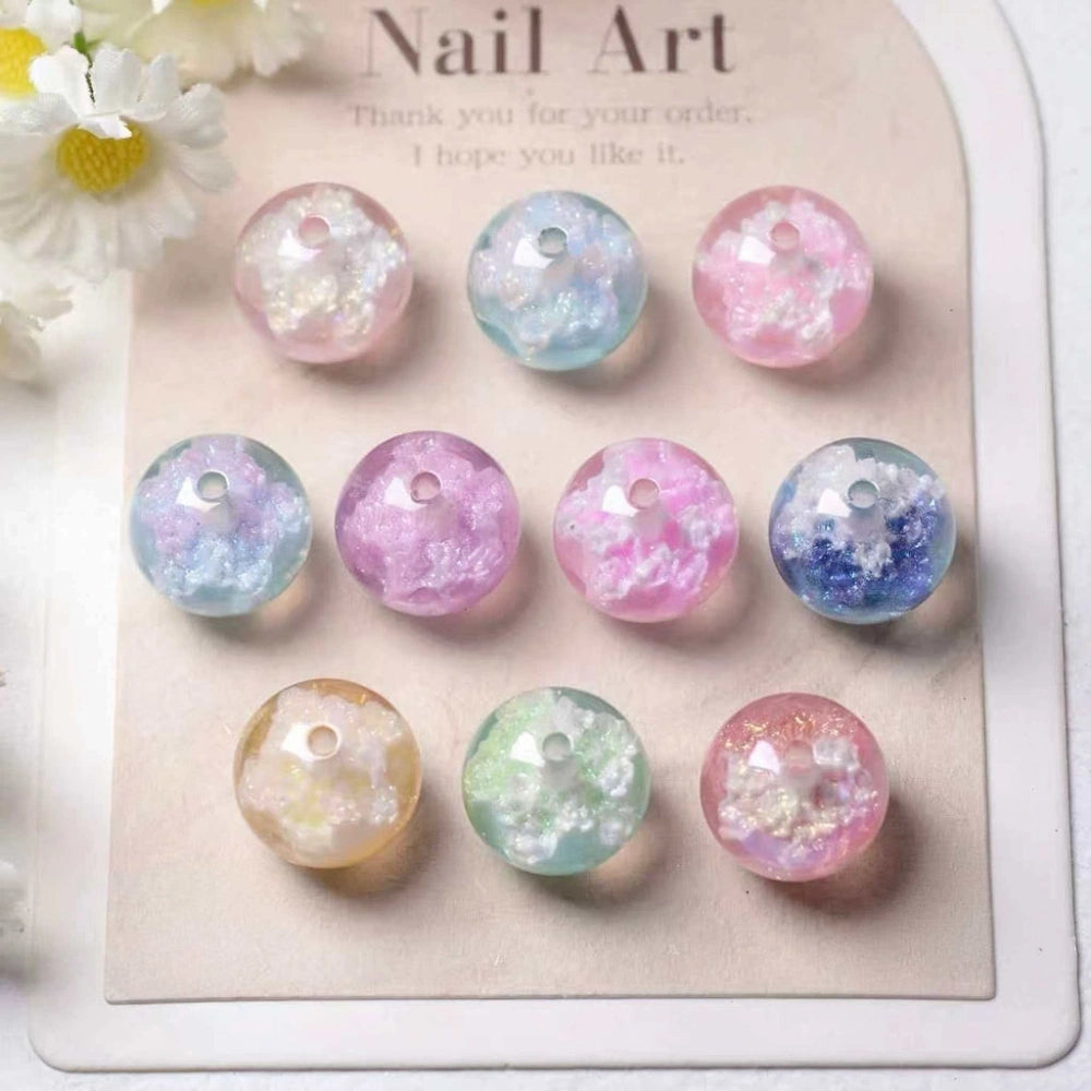 16MM round acrylic beads with galaxy glitter and iridescent pastel shimmer in pink, blue, purple, green, and yellow on a nail art display card.