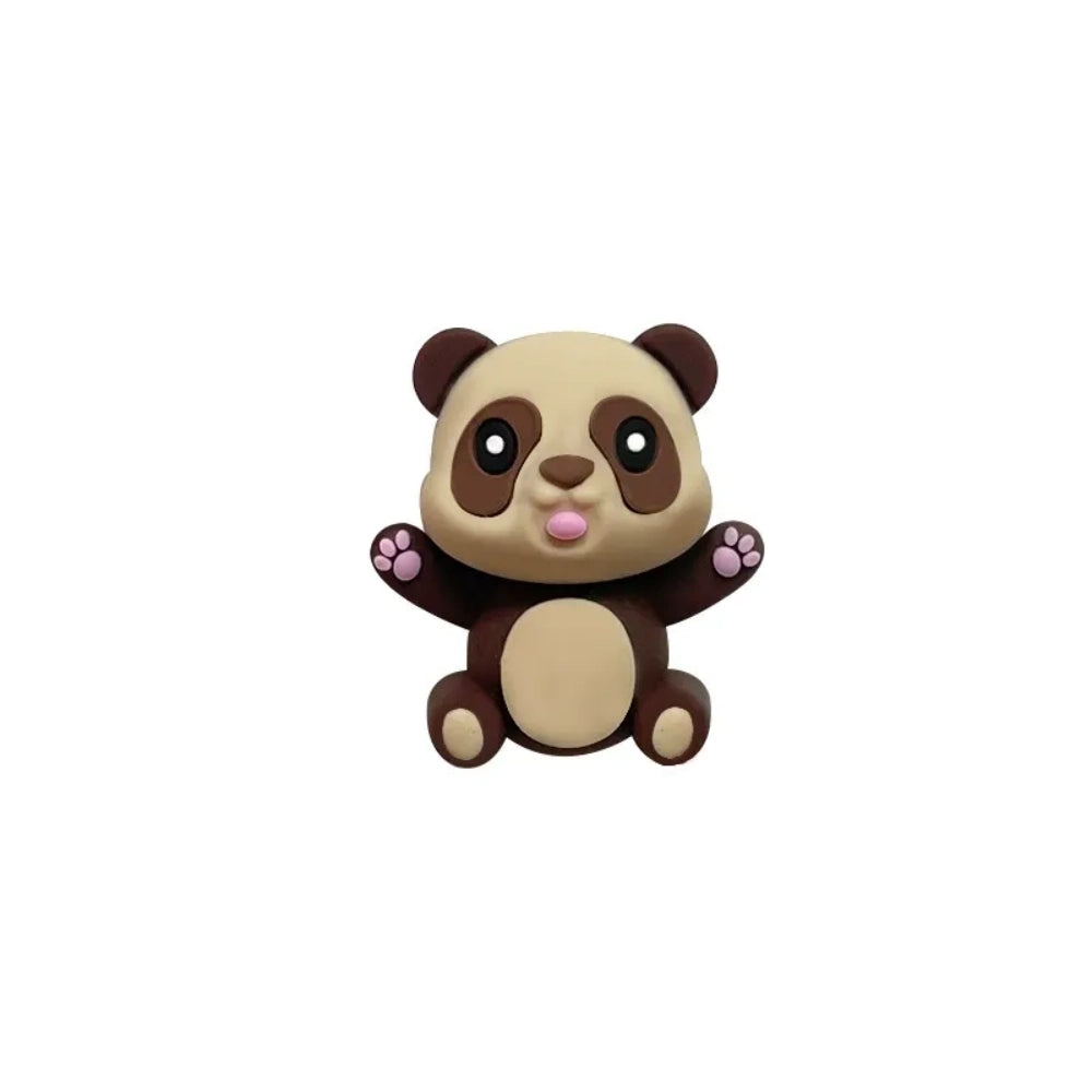 Three 3D panda silicone focal beads in gray, black-and-white, and brown colorways, each sitting on stacked round beads atop black, white, and gold beadable pens against a tan background. - Coffee