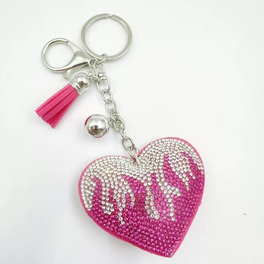 Assorted flame heart rhinestone faux leather fancy beads in green, black, pink, purple, and red with tassel and silver keychain accents - 1