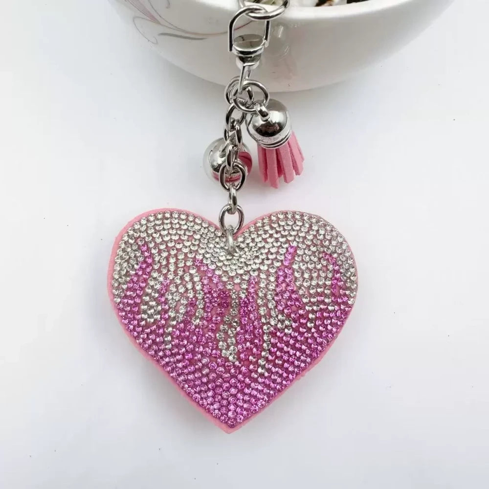 Assorted flame heart rhinestone faux leather fancy beads in green, black, pink, purple, and red with tassel and silver keychain accents - 3