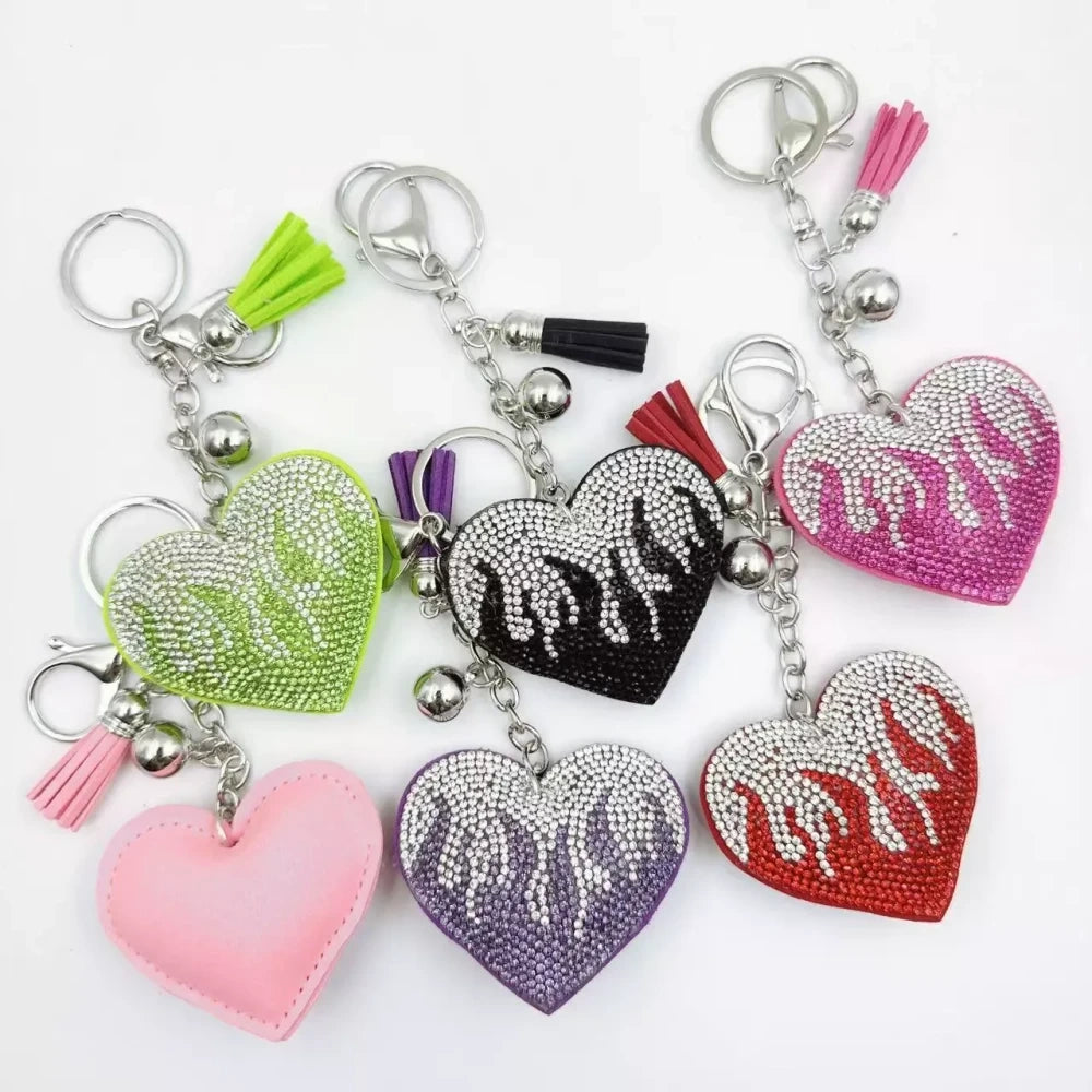 Assorted flame heart rhinestone faux leather fancy beads in green, black, pink, purple, and red with tassel and silver keychain accents - Random Mixed