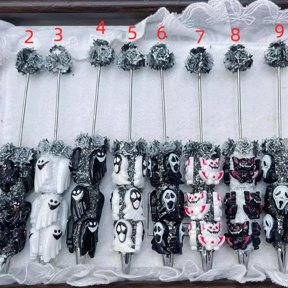 Assorted Halloween character rhinestone pens with ghost, horror mask, black cat, and silver rose accents
