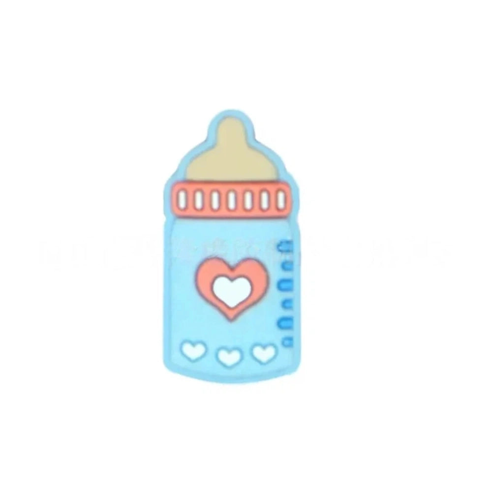 Assorted pastel silicone baby bottle flatback focal beads with heart designs in purple, teal, blue, gray, and pink on a mint background. - 2