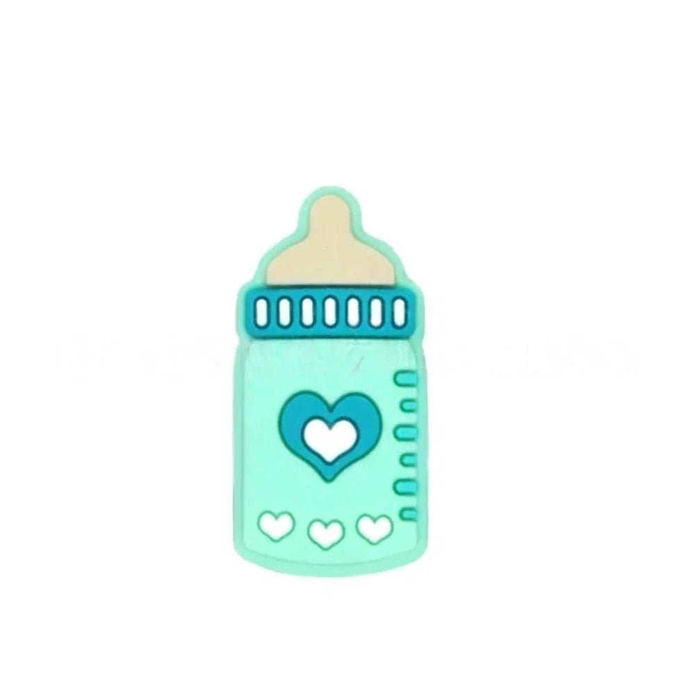 Assorted pastel silicone baby bottle flatback focal beads with heart designs in purple, teal, blue, gray, and pink on a mint background. - 5