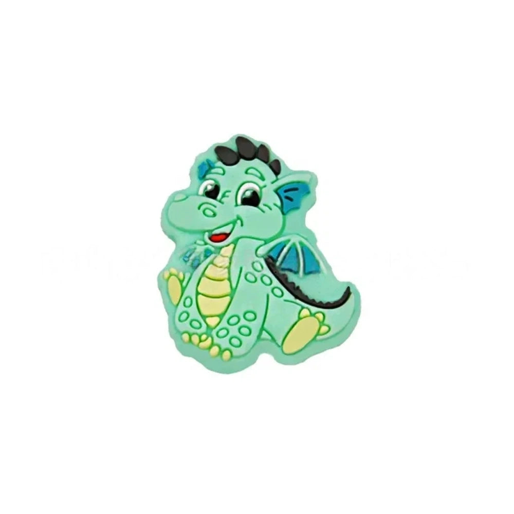 Six colorful baby dragon silicone focal beads in mint, blue, pink, green, lime, and purple displayed on white risers, featuring heart cutout belly and wing details for DIY craft projects. - Green-2