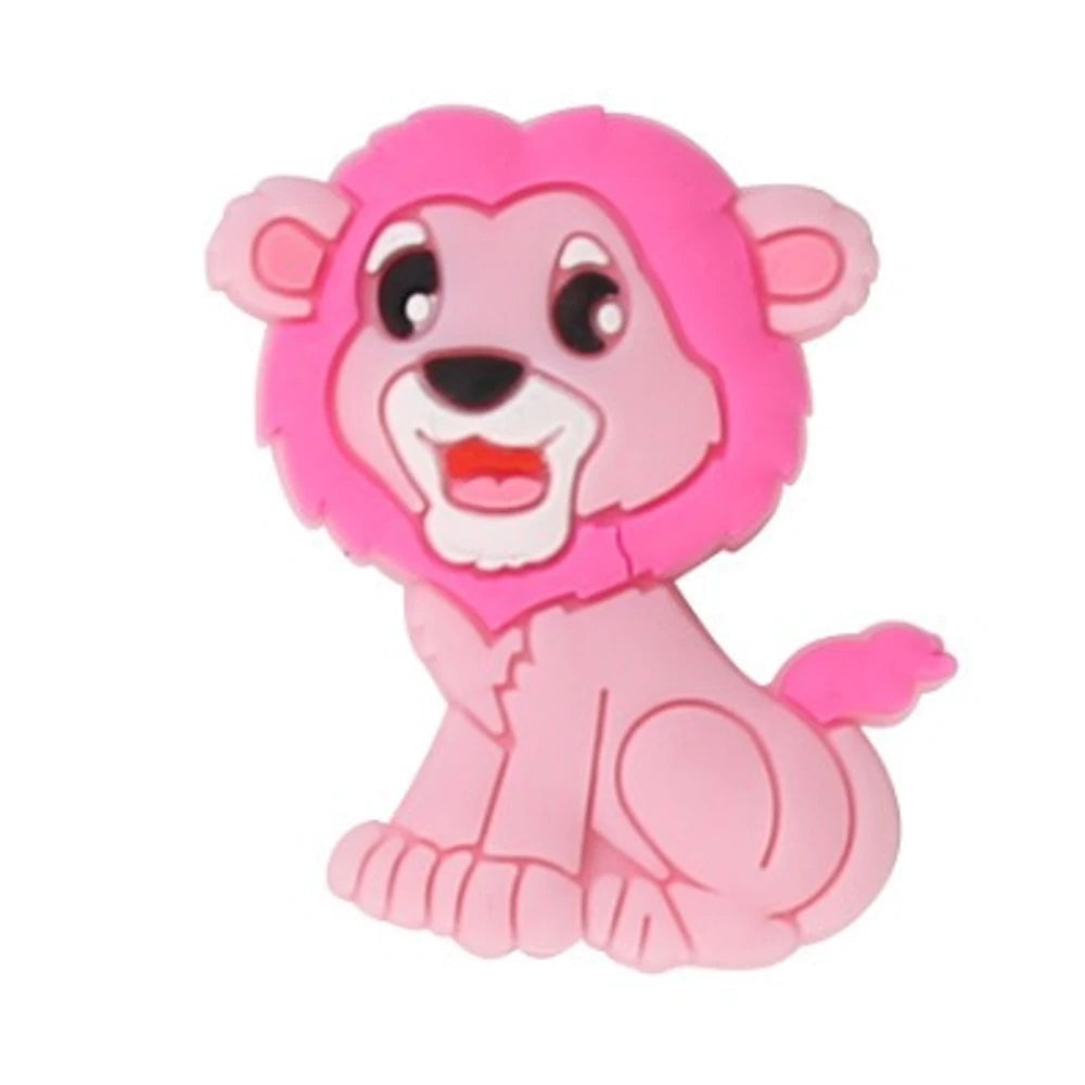 Five cartoon baby lion silicone focal beads in blue, gray, tan, pink, and mint colors, seated pose with mane detail, for DIY craft projects. - Pink