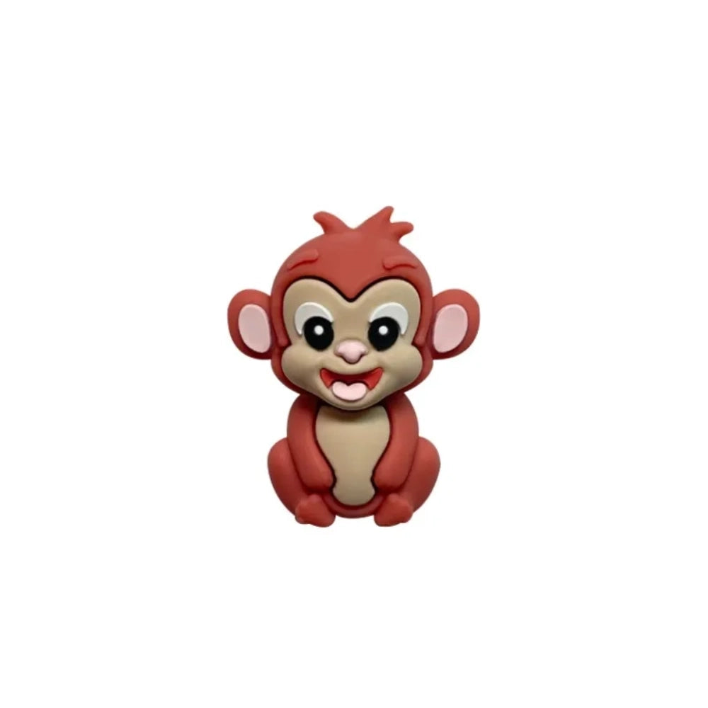 Set of 7 colorful baby monkey 3D silicone focal beads in brown, dark brown, yellow, pink, orange, rust, and purple displayed on a white pedestal with yellow background. - 1