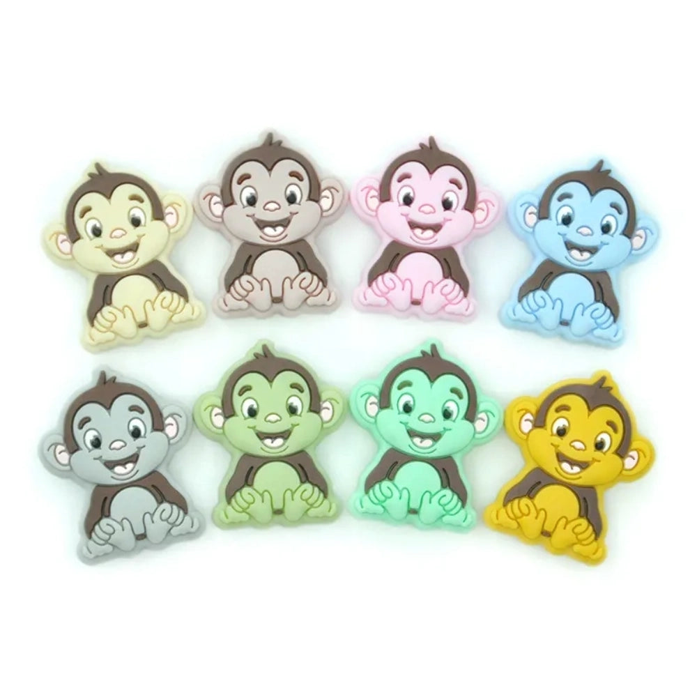8 colorful baby monkey silicone focal beads in cream, taupe, pink, blue, grey, green, mint, and yellow for DIY crafts and beadable pens - Random Mixed