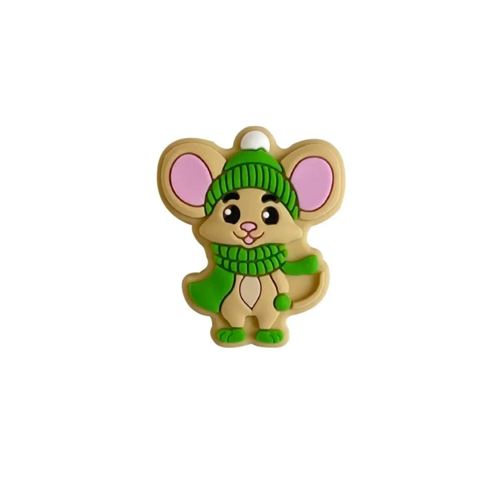 Two cartoon mouse silicone focal beads wearing Christmas winter hats and scarves, one in green and one in red, displayed in front of a white bowl on a beige background. - 1