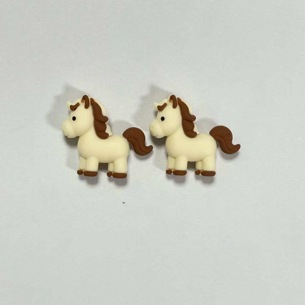 Two cream and brown 3D horse silicone focal beads with brown mane and hooves, shown side by side on white background.