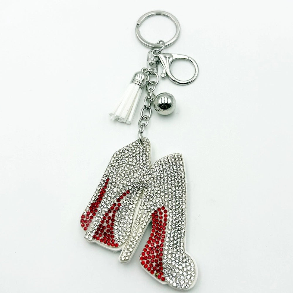 Silver and red crystal rhinestone high heel shoes keychain charm with white tassel and silver ball accent on metal chain with lobster clasp