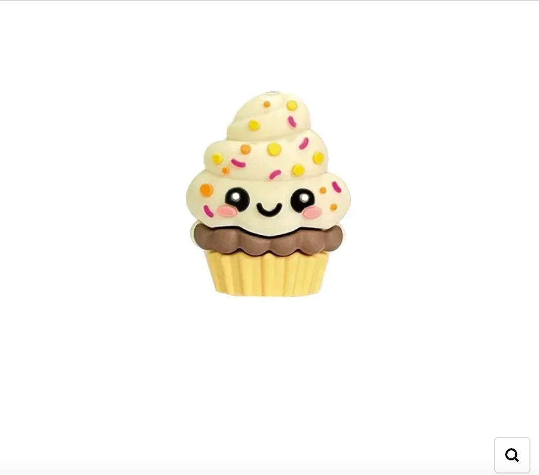 Kawaii cupcake 3D silicone focal beads with sprinkles and smiley faces displayed on colorful beadable pens against a pink background, available at DIY Mini Planet. - Orange