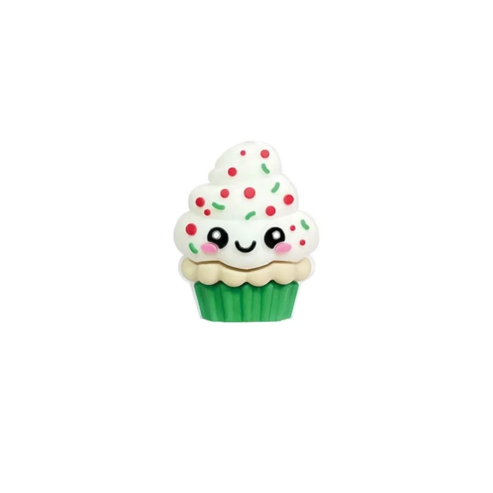 Assorted kawaii cupcake silicone focal beads with sprinkles and smiley faces shown on colorful beadable pens on a pink background, available at DIY Mini Planet. - 6