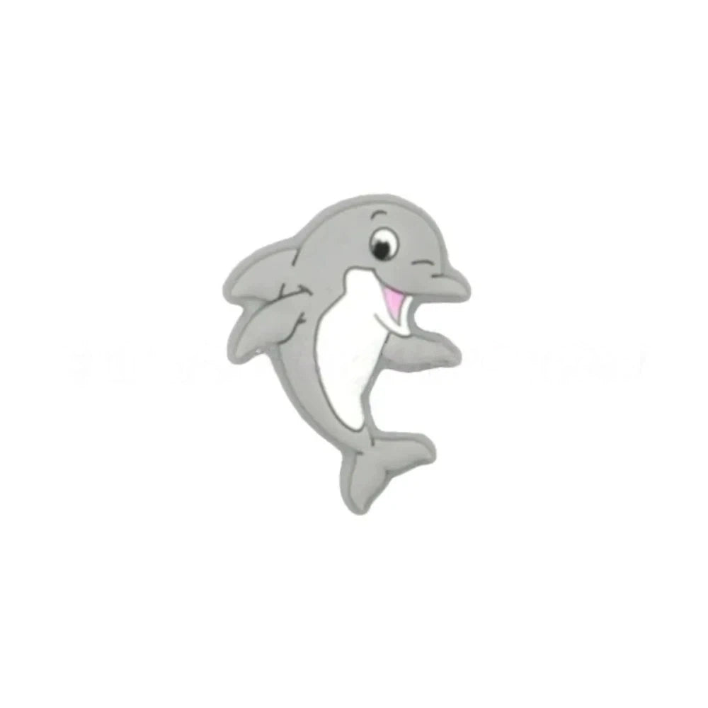 Seven colorful silicone dolphin focal beads in mint, pink, gray, navy, teal, light blue, and sage green with white belly detail, smiling cartoon style, for DIY jewelry and beadable crafts. - 3