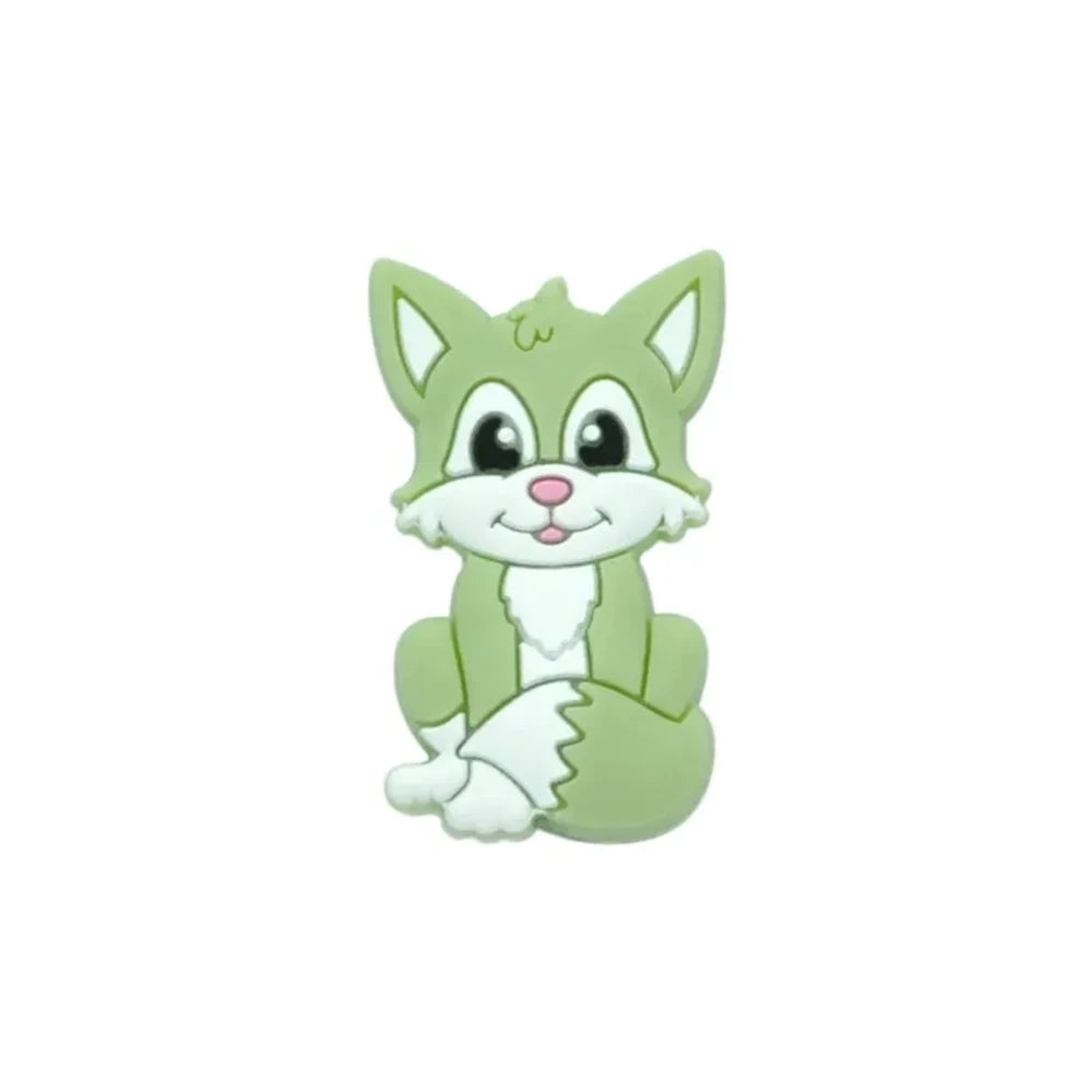 Eight cartoon fox silicone focal beads in assorted colors including gray, green, peach, blue, purple, pink, tan, and orange, featuring smiling faces and white chest details. - Matcha Green