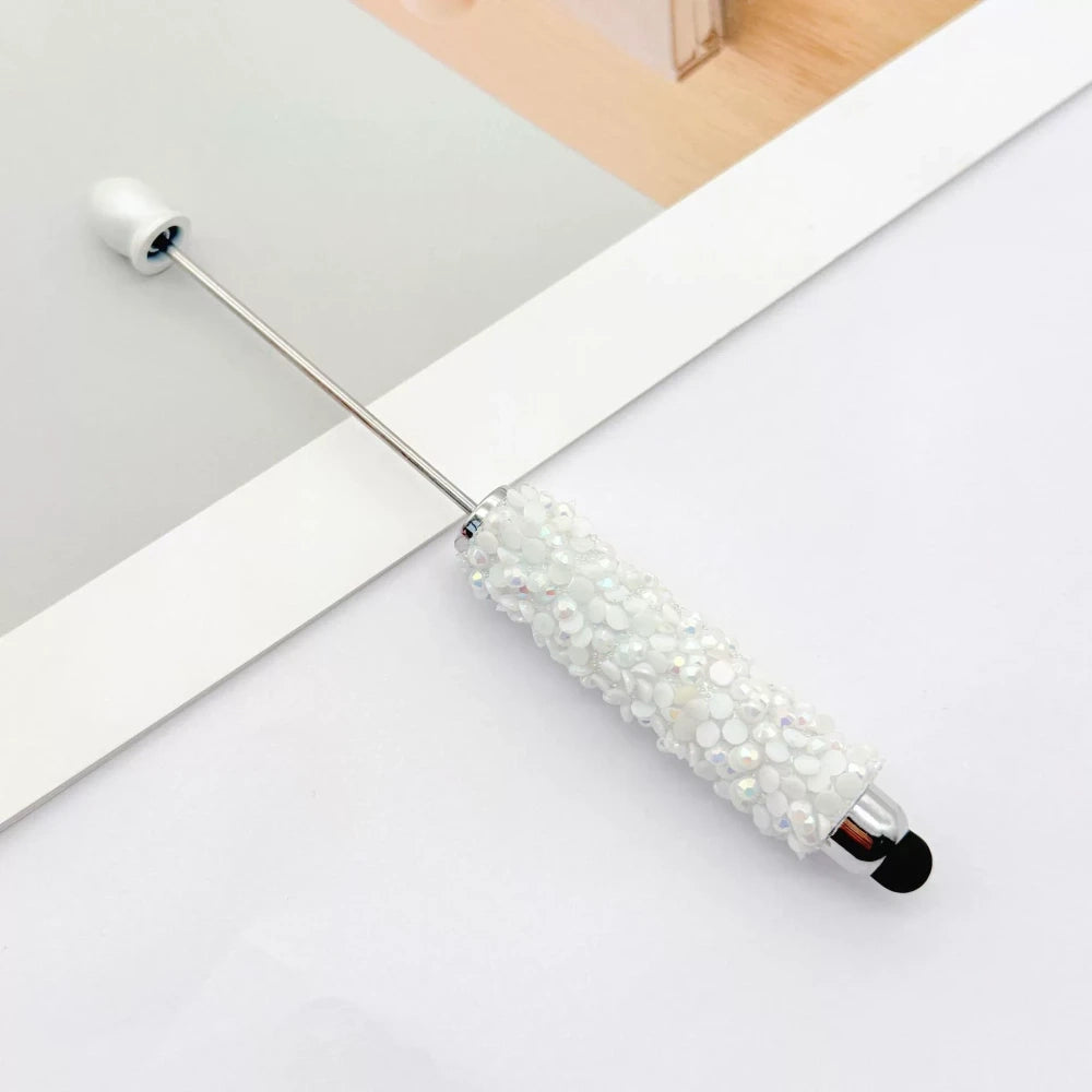 Set of 11 glitter rhinestone beadable pens in assorted colors including white, hot pink, black, multicolor, pink, light pink, teal, brown, purple, blue, and lavender, displayed on a white surface. - 3