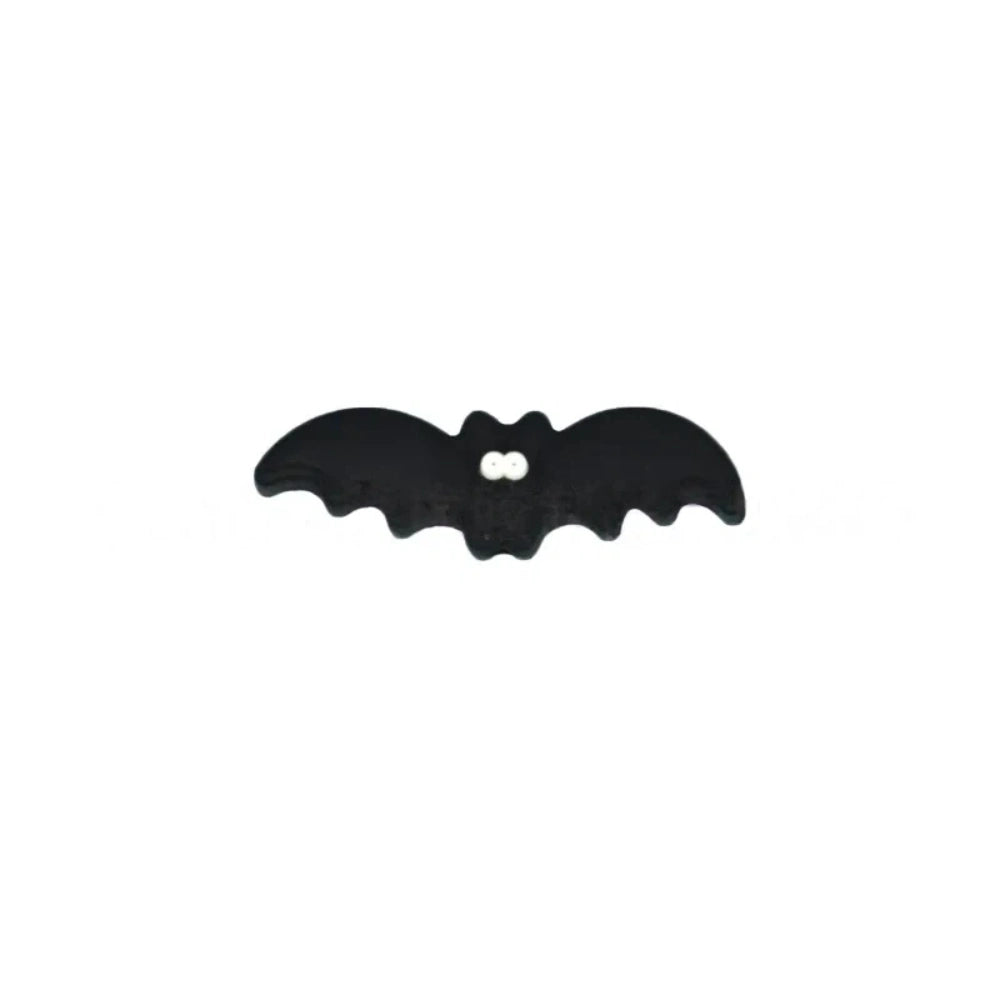 Set of 5 Halloween silicone focal beads including a BOO pumpkin, haunted house, black spider, and two bats displayed on a miniature white bench - Bat