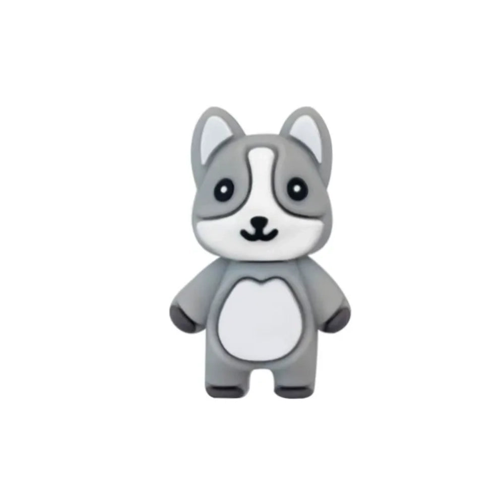 Four 3D husky dog silicone focal beads in gray, brown, black and white colorways displayed on decorative beadable pens with matching silicone round beads against a beige background. - 3