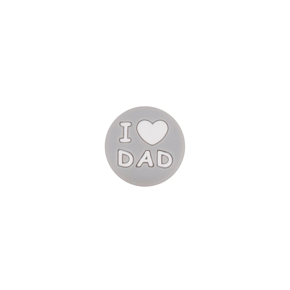 Assorted colorful round silicone focal beads printed with I Love Dad and white heart design, shown in multiple colors including blue, pink, purple, gray, teal, and peach. - Light Gray