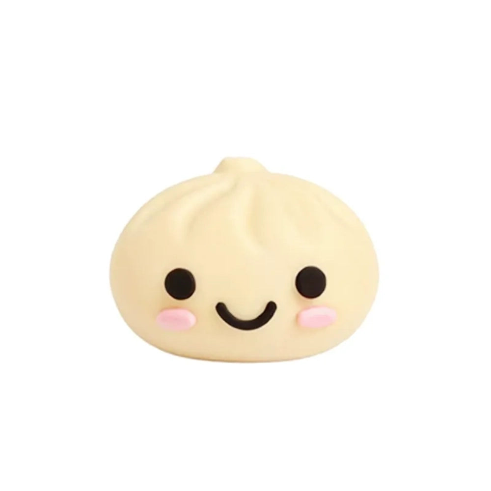 Cute kawaii smiley face dumpling bao bun silicone focal beads in cream, white, and gray colors piled in a cloud-shaped tray on a pink background - Creamy White