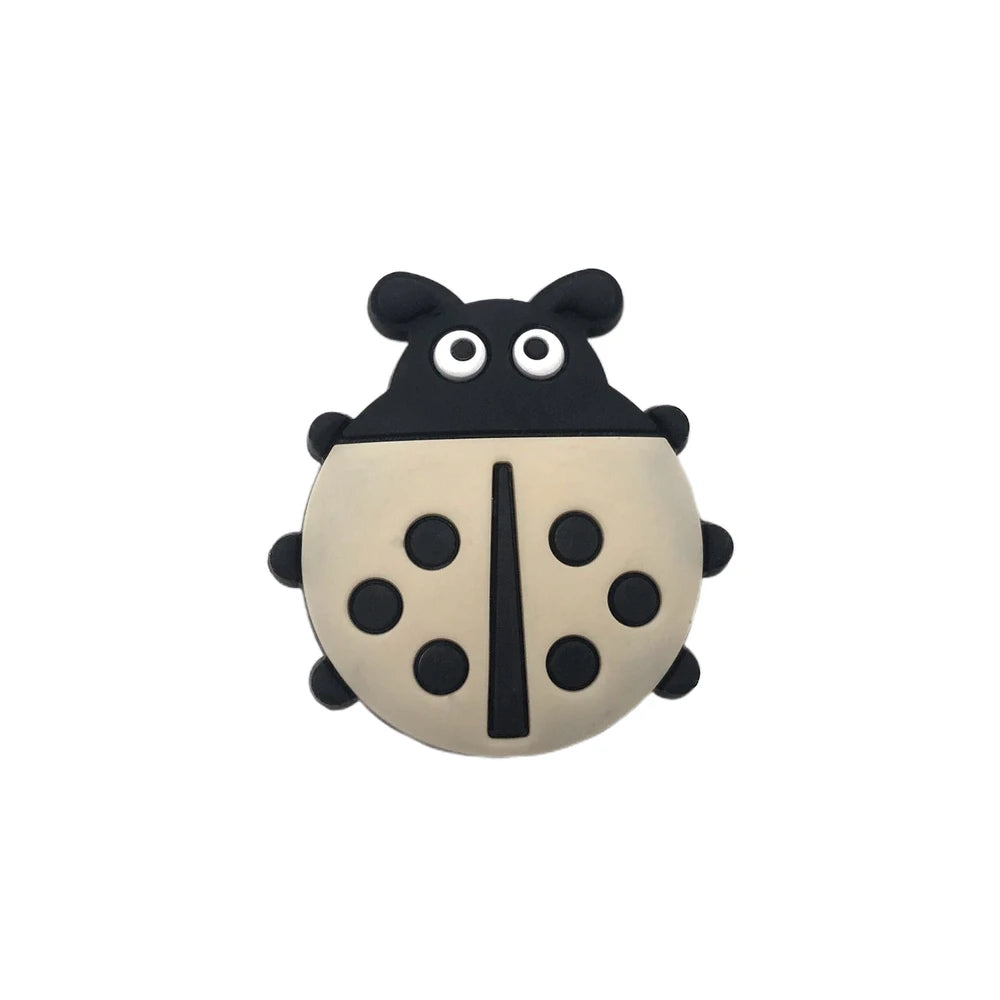 Eight colorful ladybug silicone focal beads in yellow, blue, white, mint, red, cream, gray, and teal with black spots and cartoon faces, used for beadable pens, keychains, and badge reels. - White