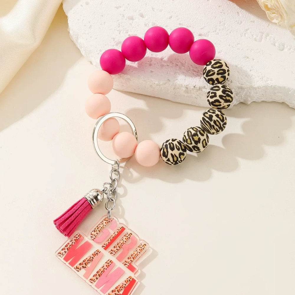 Colorful leopard print and solid silicone beaded bracelet keychains with Girl Mama and Boy Mama acrylic charms in pink and blue color schemes - 3