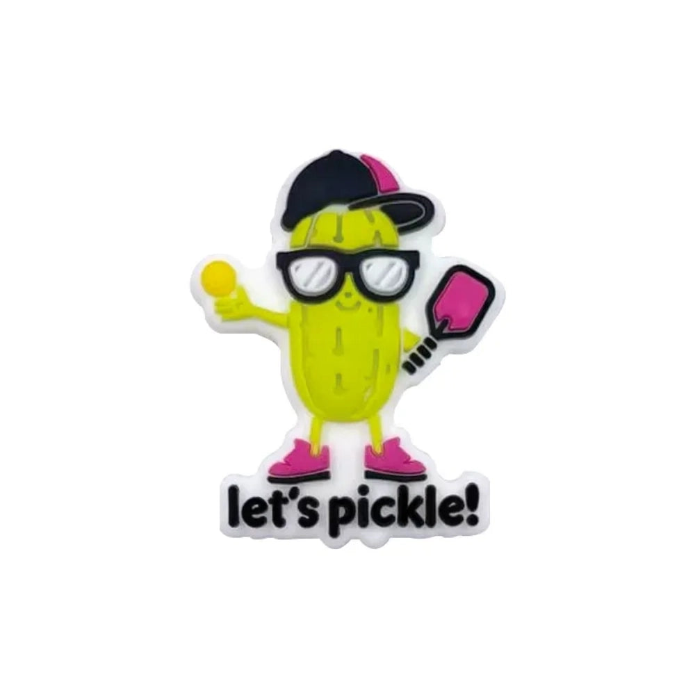 Silicone focal beads featuring a cartoon pickle character wearing glasses and a black cap holding a pickleball paddle with 'Let's Pickle!' text, shown in multiple sizes on a linen background. - Light Green