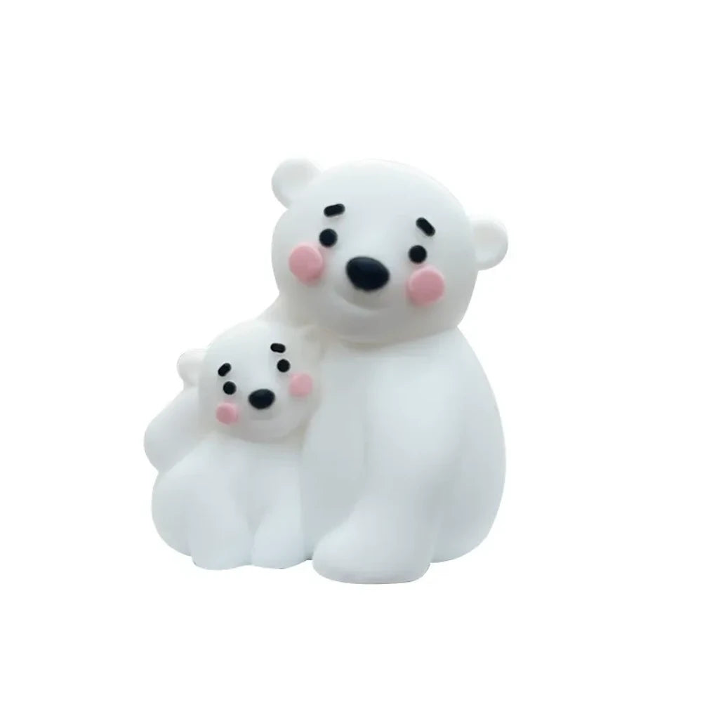 Cute mama and baby bear silicone focal beads in white, gray, and brown colorways displayed on a pink background, perfect for beadable pens, keychains, and badge reels. - White