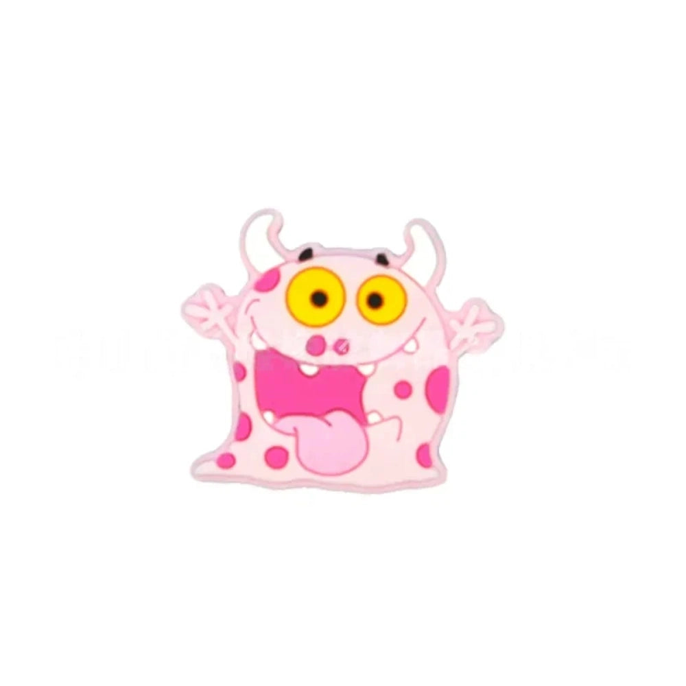 Assorted cartoon monster silicone focal beads in pink, yellow, gray, and mint green with big yellow eyes and horns, displayed in a white ceramic dish for DIY crafting projects. - 3