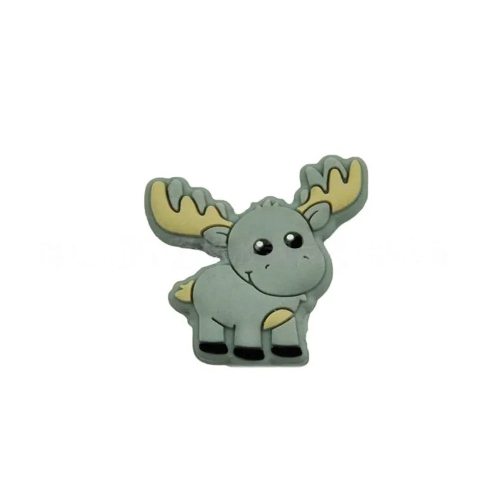 Assorted pastel and earth tone moose silicone focal beads strung on a cord and displayed in a white dish on a teal background, ideal for beadable pens, keychains, and badge reels. - 3