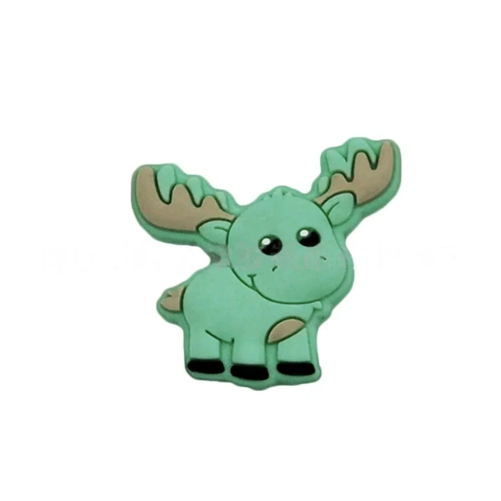 Assorted pastel and earth tone moose silicone focal beads strung on a cord and displayed in a white dish on a teal background, ideal for beadable pens, keychains, and badge reels. - 6