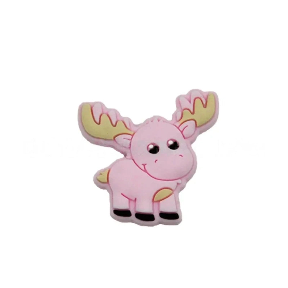 Assorted pastel and earth tone moose silicone focal beads strung on a cord and displayed in a white dish on a teal background, ideal for beadable pens, keychains, and badge reels. - 8
