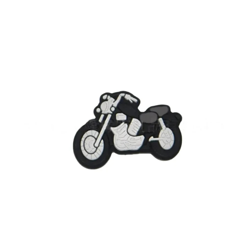 Assorted color motorcycle silicone focal beads in red, blue, yellow, green, and white displayed in a white dish on a blue background, for DIY beadable pens and keychains. - Black