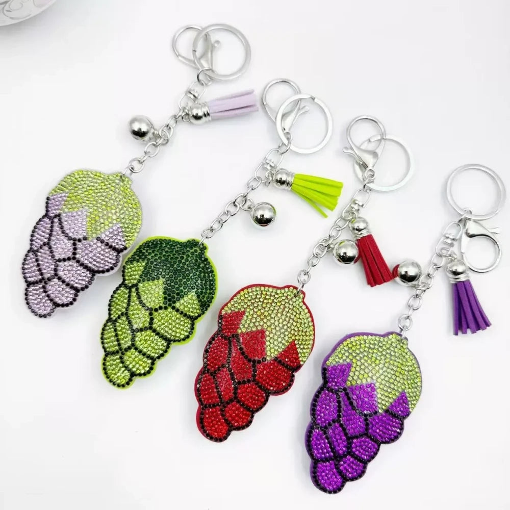 Four multicolor grape cluster rhinestone fancy beads shown as keychain charms with tassels and silver hardware. - Random Mixed