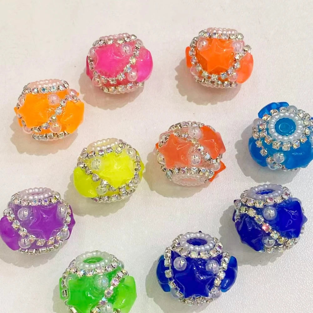 Assorted neon color resin fancy beads with star pattern, rhinestone crystal trim, and pearl detailing in pink, orange, yellow, purple, green, and blue for DIY jewelry making and beadable pens.